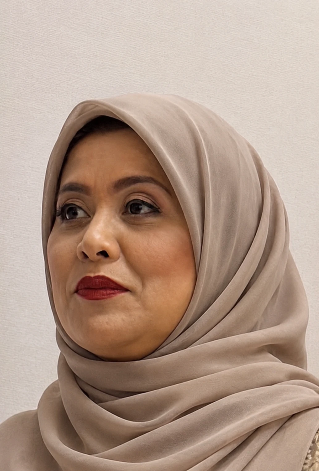 Portrait of Layla Bernal wearing a beige hijab